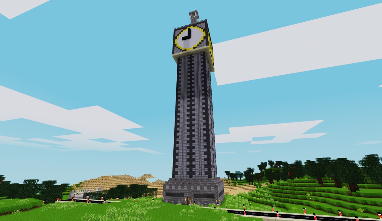 Tall clock tower rising over rolling green hills